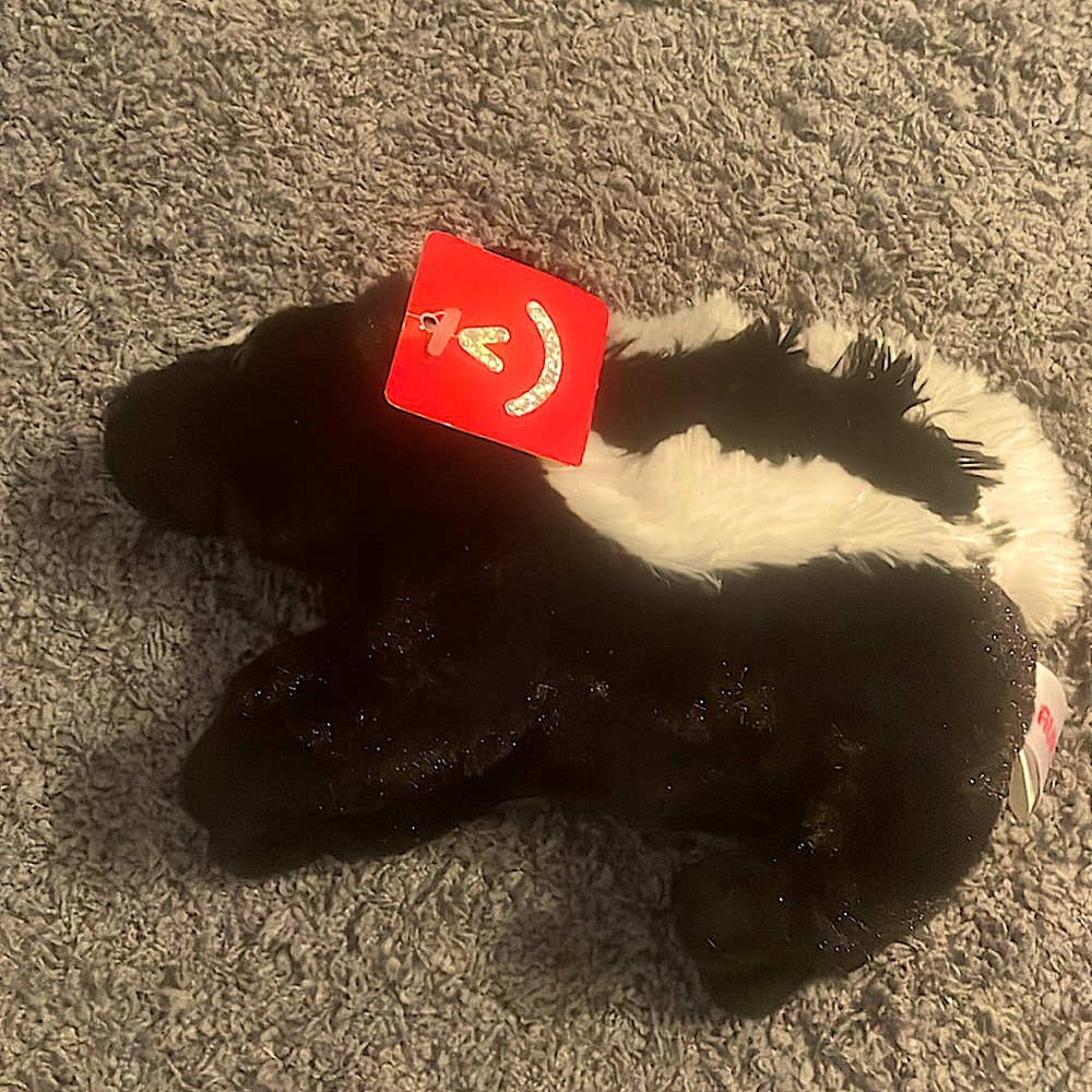 Skunk stuffed animal toy aurora handle carry